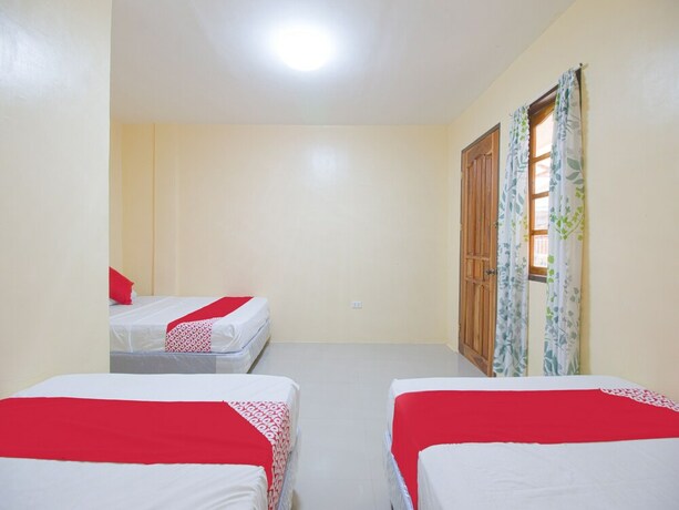 Imagen de la habitación del Hotel OYO 787 Indino Guest House 2and5. Foto 17