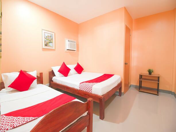 Imagen de la habitación del Hotel OYO 787 Indino Guest House 2and5. Foto 19
