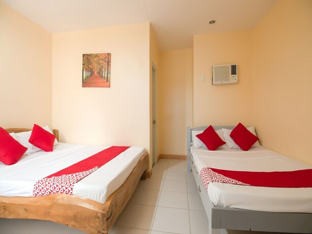 Imagen de la habitación del Hotel OYO 787 Indino Guest House 2and5. Foto 24