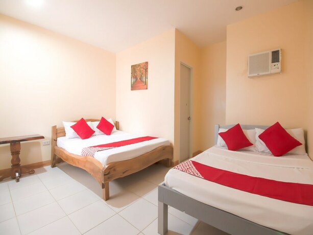 Imagen de la habitación del Hotel OYO 787 Indino Guest House 2and5. Foto 30
