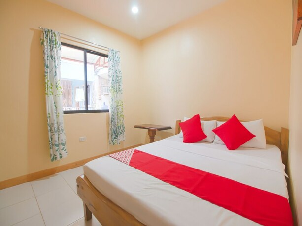 Imagen de la habitación del Hotel OYO 787 Indino Guest House 2and5. Foto 31