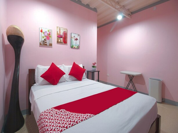 Imagen de la habitación del Hotel OYO 787 Indino Guest House 2and5. Foto 34