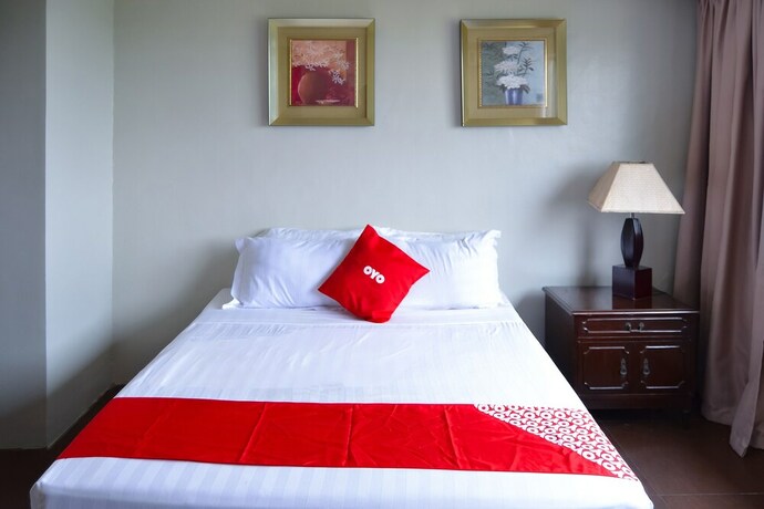 Imagen de la habitación del Hotel OYO 791 Bell Mansion. Foto 17