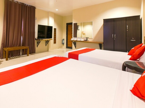 Imagen de la habitación del Hotel OYO 792 Wilae's Suites. Foto 4