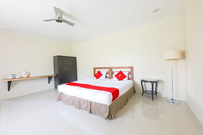 Imagen de la habitación del Hotel OYO 792 Wilae's Suites. Foto 7