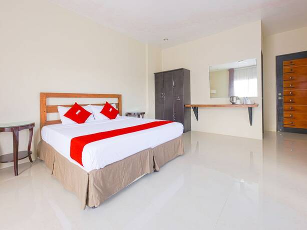 Imagen de la habitación del Hotel OYO 792 Wilae's Suites. Foto 10