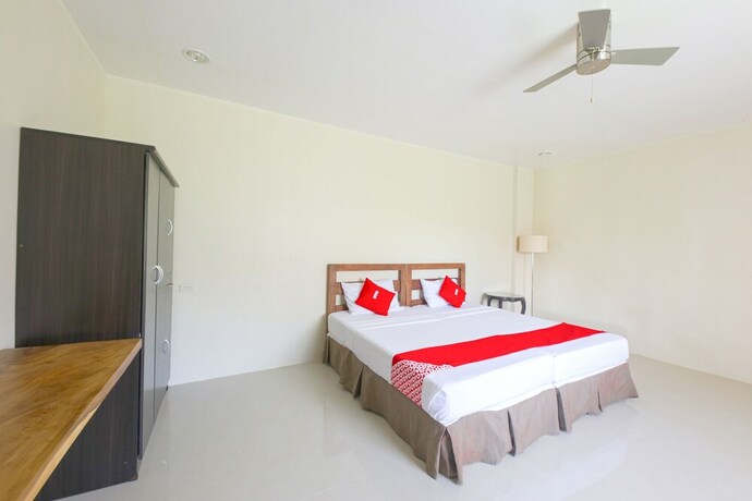 Imagen de la habitación del Hotel OYO 792 Wilae's Suites. Foto 11
