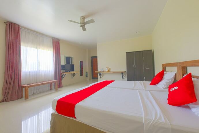 Imagen de la habitación del Hotel OYO 792 Wilae's Suites. Foto 12