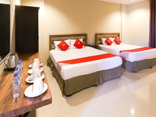 Imagen de la habitación del Hotel OYO 792 Wilae's Suites. Foto 13