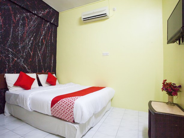 Imagen de la habitación del Hotel OYO 796 JR. Foto 3