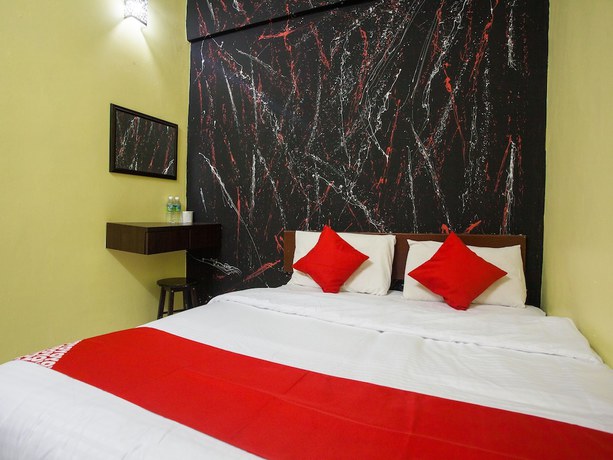 Imagen de la habitación del Hotel OYO 796 JR. Foto 5