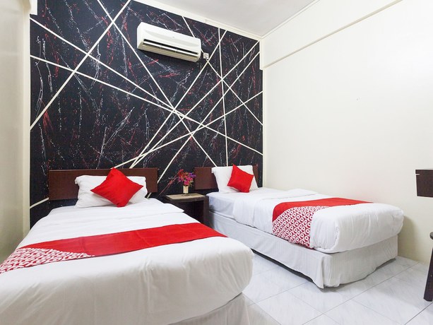 Imagen de la habitación del Hotel OYO 796 JR. Foto 7