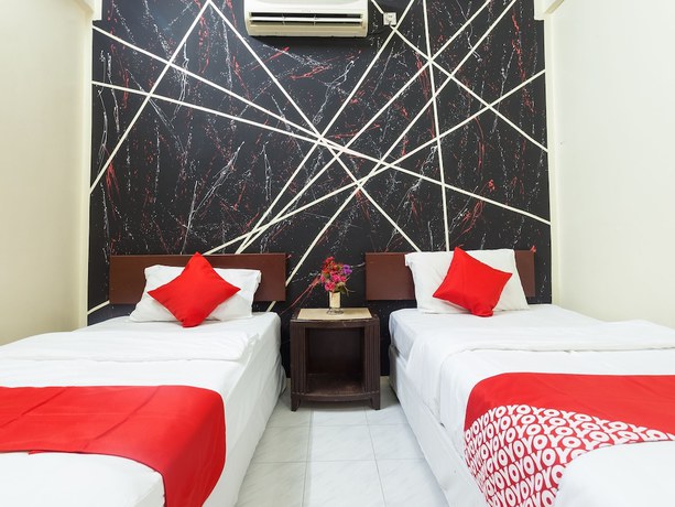 Imagen de la habitación del Hotel OYO 796 JR. Foto 9