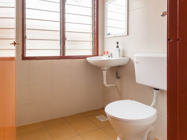 Imagen de la habitación del Hotel OYO 796 JR. Foto 12