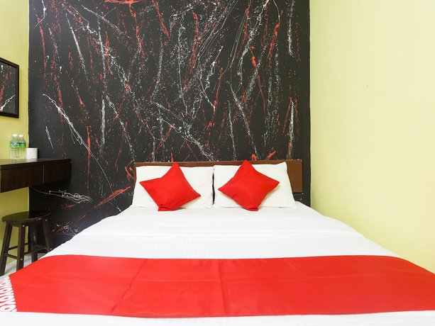 Imagen de la habitación del Hotel OYO 796 JR. Foto 13