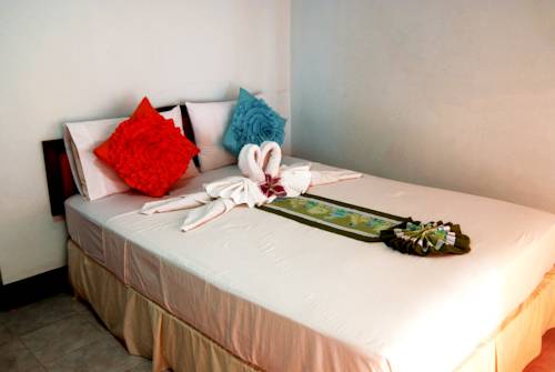 Imagen de la habitación del Hotel OYO 797 Pink House Bungalow. Foto 6