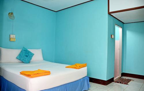 Imagen de la habitación del Hotel OYO 797 Pink House Bungalow. Foto 9