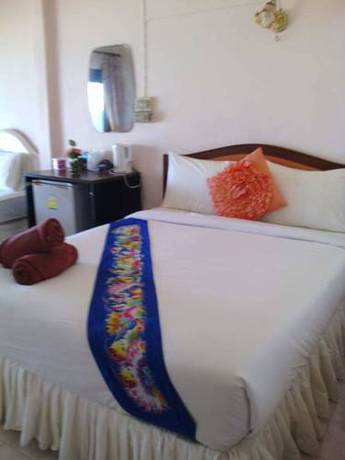 Imagen de la habitación del Hotel OYO 797 Pink House Bungalow. Foto 15