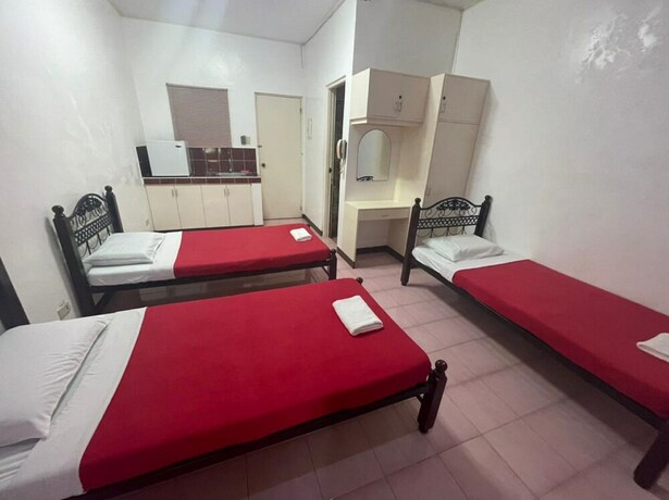 Imagen de la habitación del Hotel OYO 803 Amirsache Villa. Foto 17