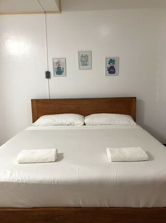 Imagen de la habitación del Hotel OYO 803 Amirsache Villa. Foto 19