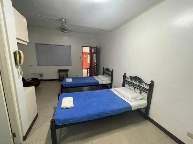 Imagen de la habitación del Hotel OYO 803 Amirsache Villa. Foto 22