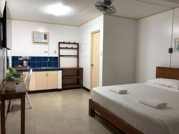 Imagen de la habitación del Hotel OYO 803 Amirsache Villa. Foto 23