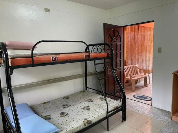 Imagen de la habitación del Hotel OYO 803 Amirsache Villa. Foto 28