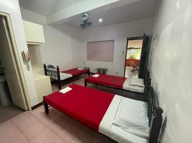 Imagen de la habitación del Hotel OYO 803 Amirsache Villa. Foto 32