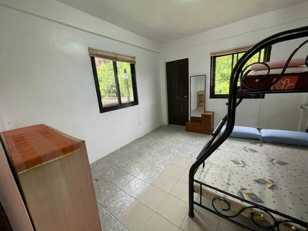 Imagen de la habitación del Hotel OYO 803 Amirsache Villa. Foto 33