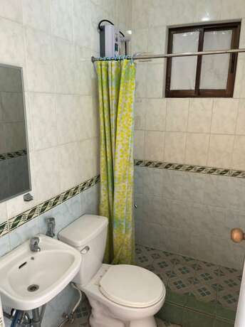 Imagen de la habitación del Hotel OYO 803 Amirsache Villa. Foto 34