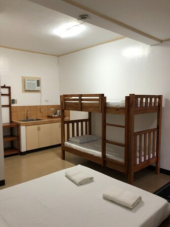 Imagen de la habitación del Hotel OYO 803 Amirsache Villa. Foto 35