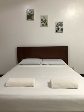 Imagen de la habitación del Hotel OYO 803 Amirsache Villa. Foto 37