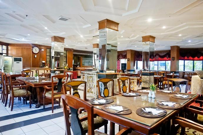 Imagen del bar/restaurante del Hotel OYO 805 Hotel Dyan Graha. Foto 1