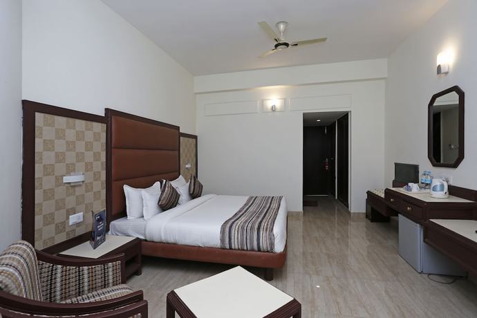 Imagen de la habitación del Hotel OYO 8078 The Central Palm. Foto 4