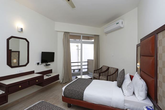 Imagen de la habitación del Hotel OYO 8078 The Central Palm. Foto 5