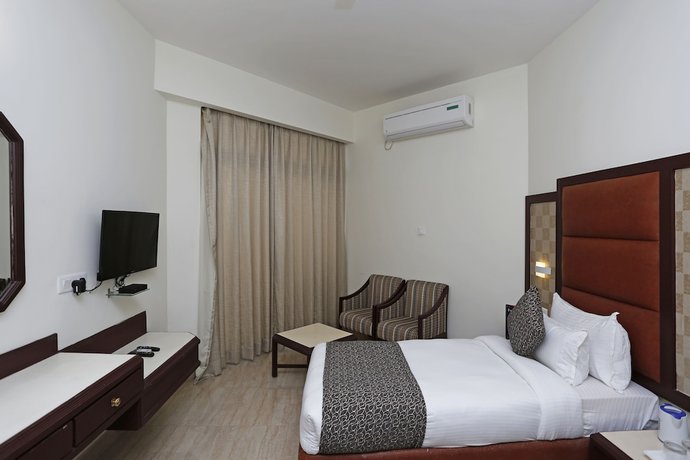 Imagen de la habitación del Hotel OYO 8078 The Central Palm. Foto 6