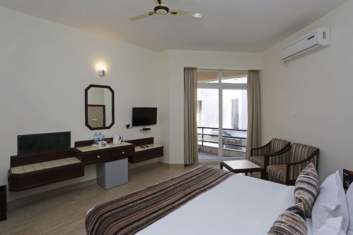 Imagen de la habitación del Hotel OYO 8078 The Central Palm. Foto 8