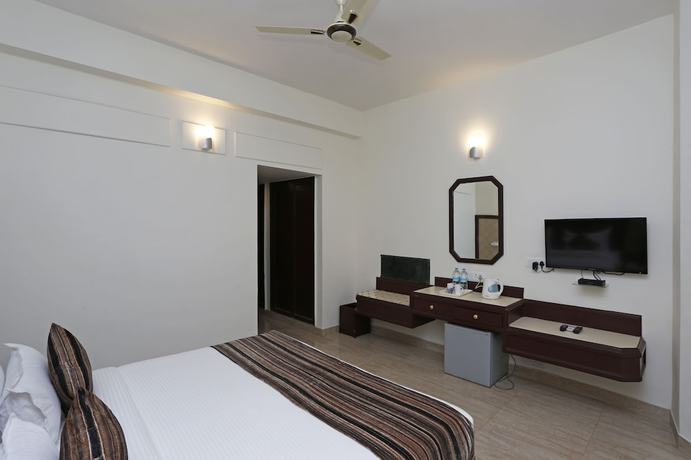 Imagen de la habitación del Hotel OYO 8078 The Central Palm. Foto 10