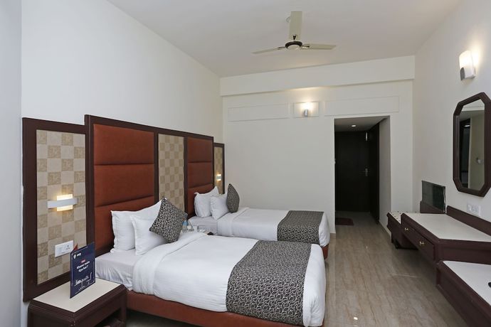 Imagen de la habitación del Hotel OYO 8078 The Central Palm. Foto 12