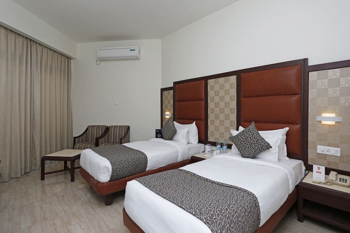 Imagen de la habitación del Hotel OYO 8078 The Central Palm. Foto 13