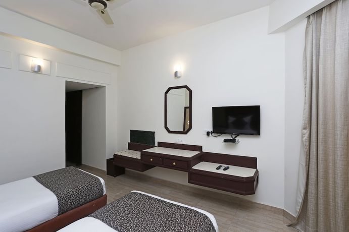 Imagen de la habitación del Hotel OYO 8078 The Central Palm. Foto 14