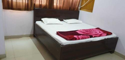 Imagen de la habitación del Hotel OYO 80932 RR Guest House. Foto 10