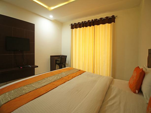 Imagen de la habitación del Hotel OYO 8095 Taj Castle. Foto 13