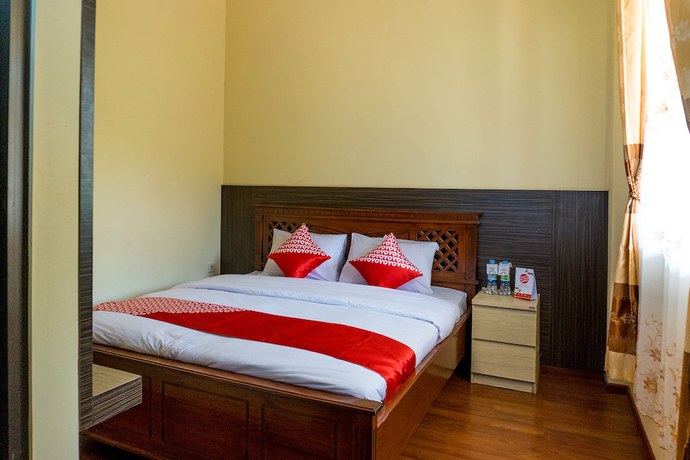 Imagen de la habitación del Hotel OYO 812 Tirta Bahari. Foto 4