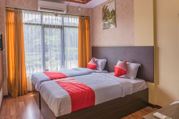 Imagen de la habitación del Hotel OYO 812 Tirta Bahari. Foto 5