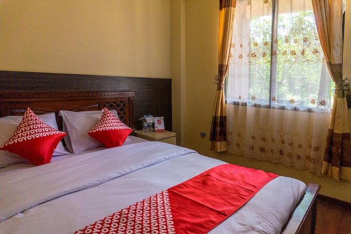 Imagen de la habitación del Hotel OYO 812 Tirta Bahari. Foto 8