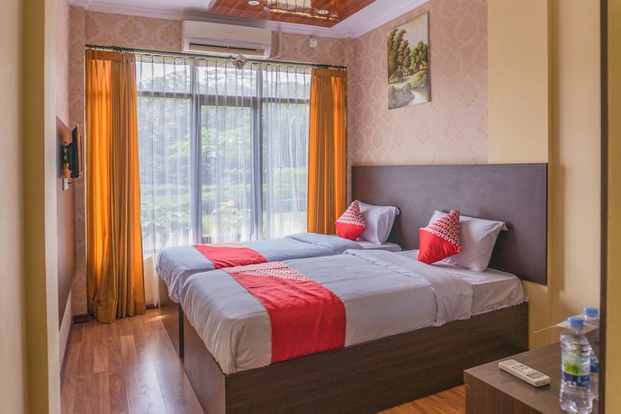 Imagen de la habitación del Hotel OYO 812 Tirta Bahari. Foto 10