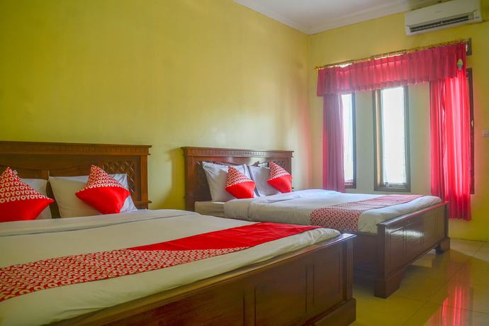 Imagen de la habitación del Hotel OYO 812 Tirta Bahari. Foto 12