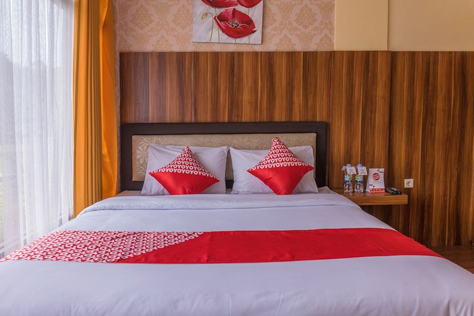 Imagen de la habitación del Hotel OYO 812 Tirta Bahari. Foto 17