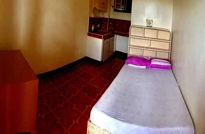 Imagen de la habitación del Hotel OYO 833 Ln Apartelle. Foto 4